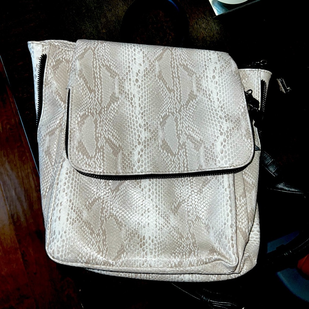 Perfect condition backpack purse. Purchased and used a few times. Mint condition